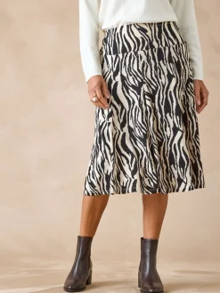 Jupe en maille, entièrement élastiquée Femme Jupe