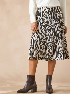 Jupe en maille, entièrement élastiquée Femme Jupe